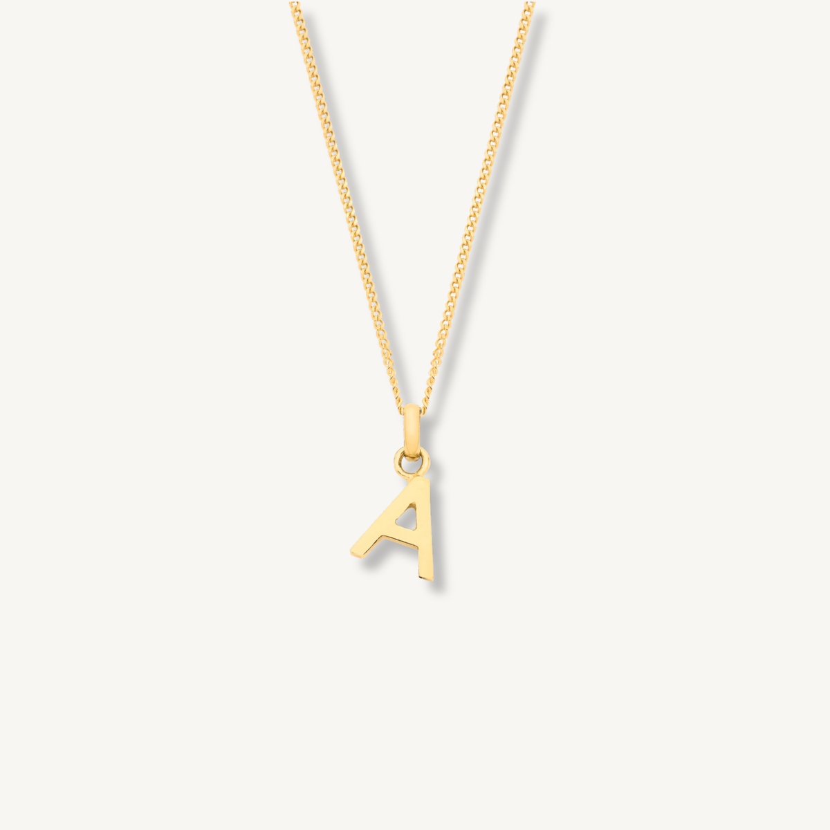 Solid 9ct yellow gold initial letter necklace on curb chain