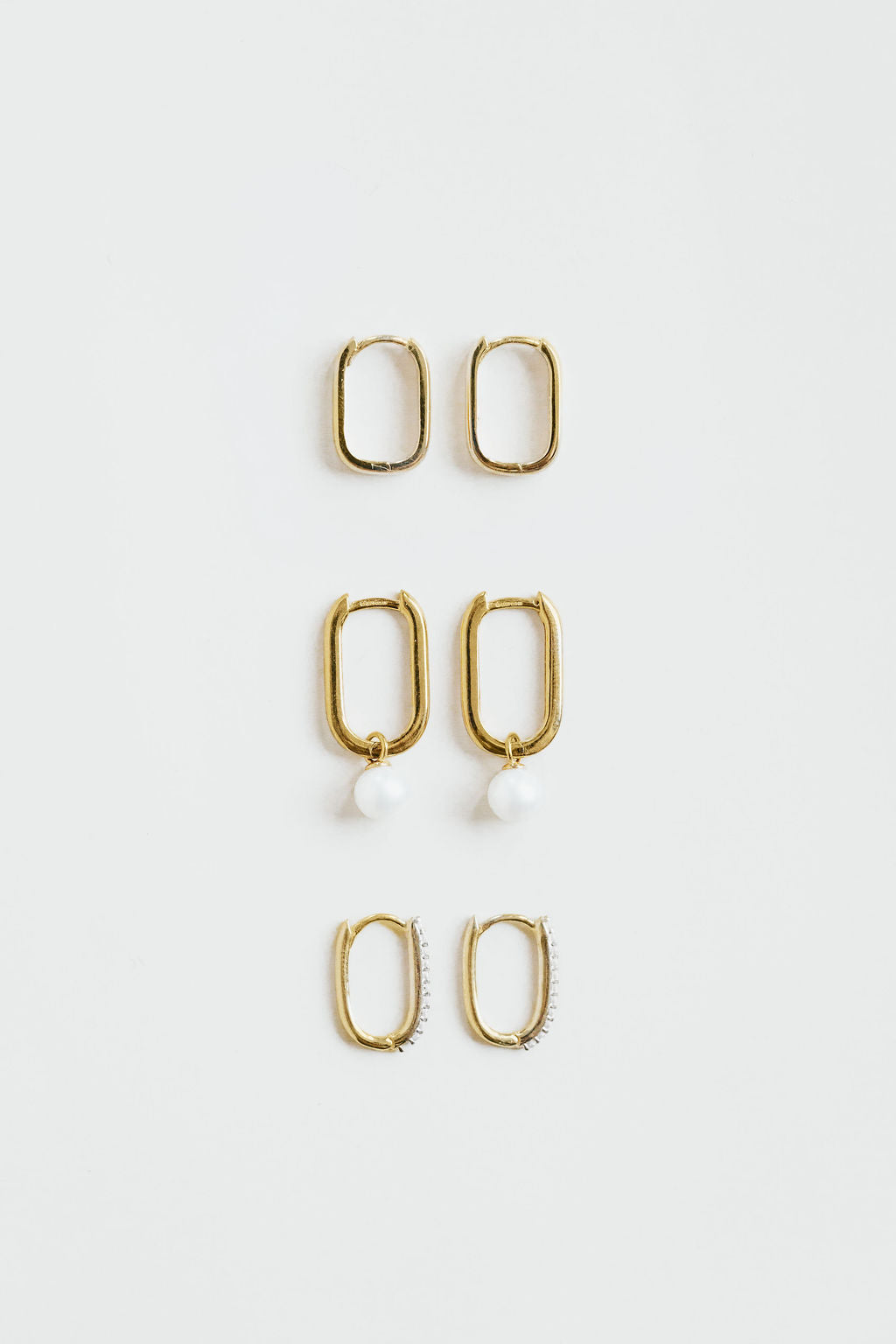 Pearl drop rectangle hoop earrings in 9ct yellow gold, worn