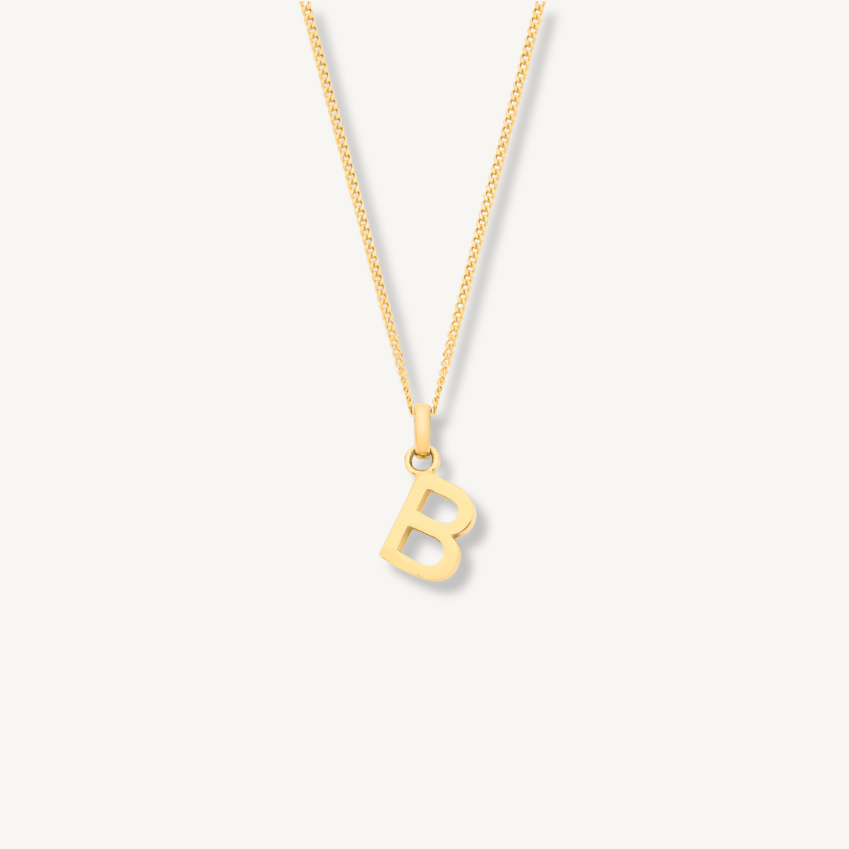 9ct yellow gold initial letter pendant detail