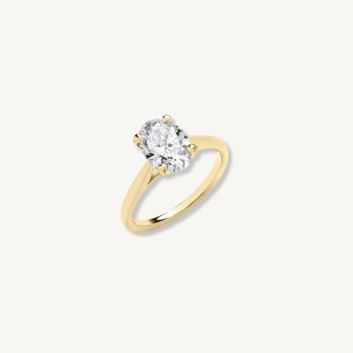 2ct oval cut lab grown diamond engagement ring in 9ct yellow gold, IGI certified