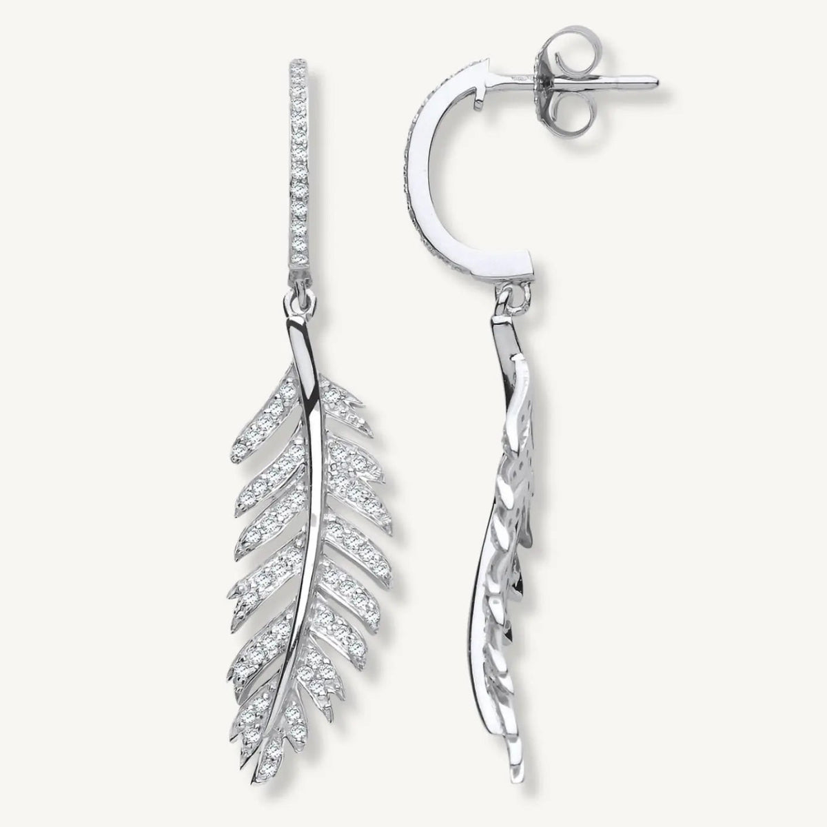 Silver feather-shaped earrings on a white background
